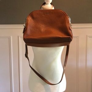 Lodi’s tan  leather handbag with strap